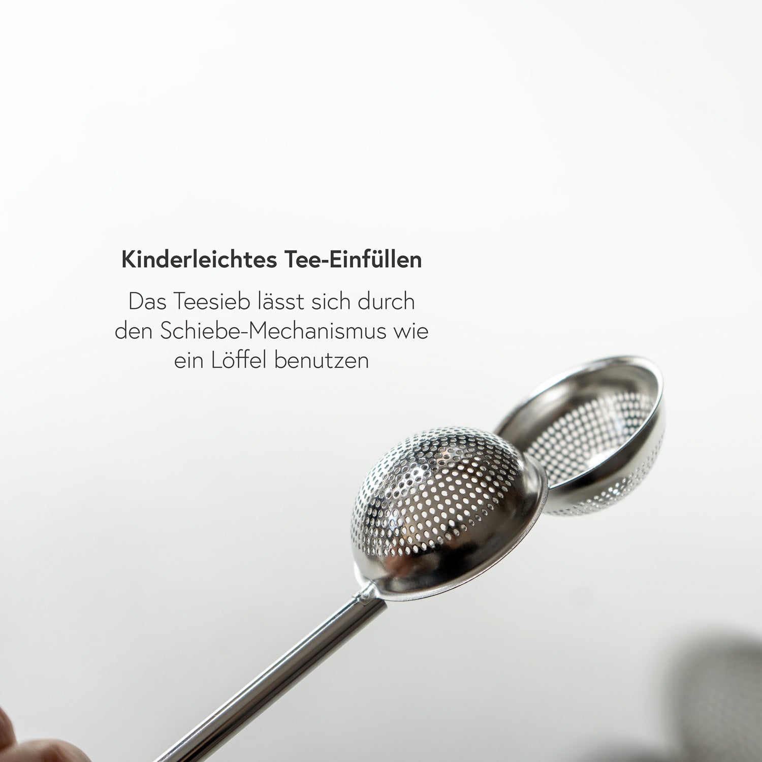 Teeball mit Feder-Öffnung